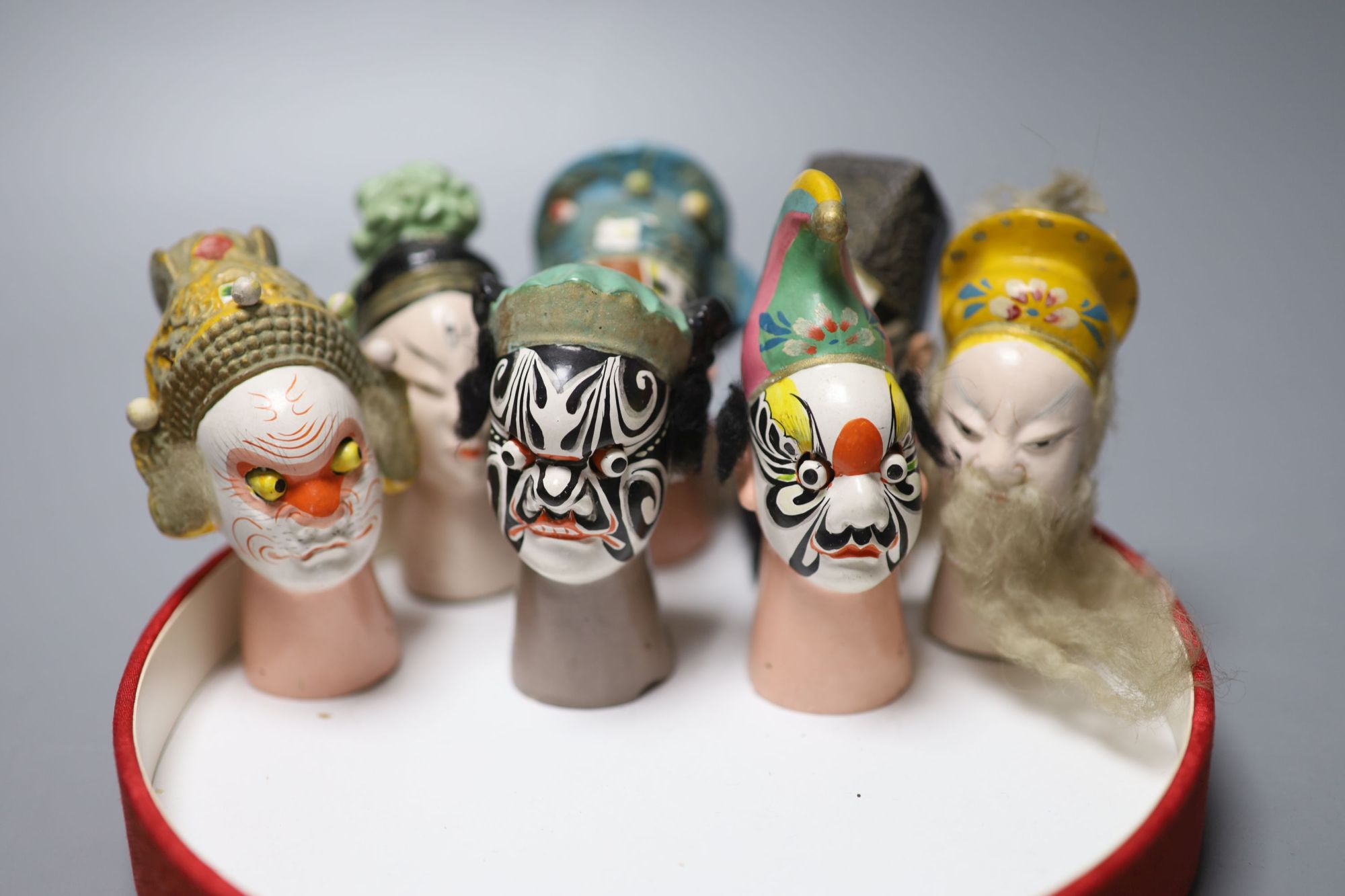 Eleven Chinese painted clay puppet heads, Fujian Province, 20th century